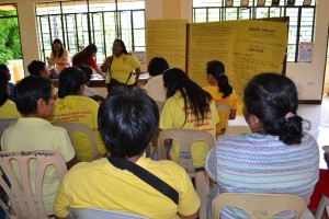 Maribel Audencia of Brgy. Balijuagan, Roxas City shares some information during the Family Development Session in their barangay.