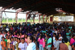 Beneficiaries of Pantawid Pamilya in Dao, Capiz patiently waited in line to get their cash grants at the Municipal Gym that was damaged by super typhoon Yolanda.