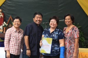 Ms. Rosario A. Sanagustin, Social Welfare Officer V (second from right), received the Loyalty Award for serving the agency for 35 years. With her are Lucita Villanueva (leftmost), chief of the Policy and Plans Division, Assistant Regional Director for Administration Evangeline Felecio (rightmost) and Director Restituto B. Macuto of the Disaster Risk Reduction and Response Operations Central Office (second from left)./dswd6