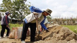 Pantawid Pamilya beneficiary Gemma Tanutan of Lemery, Iloilo proves she can handle hard labor when she worked in the construction of the classroom building in their barangay.