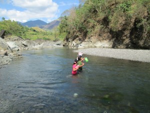 Locals crossing the river.