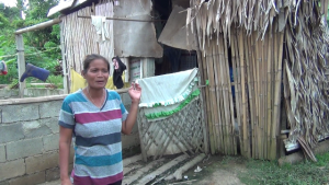 Ethelda shows the shanty they occupied after Typhoon Yolanda