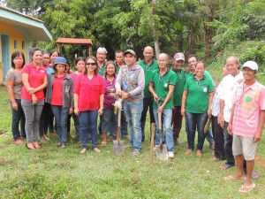 Ninfa Cape Alejandro (third from left, wearing hat), now a DSWD worker, is happy to share that she was once a beneficiary of Pantawid Pamilyang Pilipino Program. Ninfa is shown here with fellow workers during a recent groundbreaking ceremony for an P818,000-worth health center in Brgy. Matnog, Ivisan, Capiz. Also in photo is Mayor Felipe Neri Yap (center, in gray).